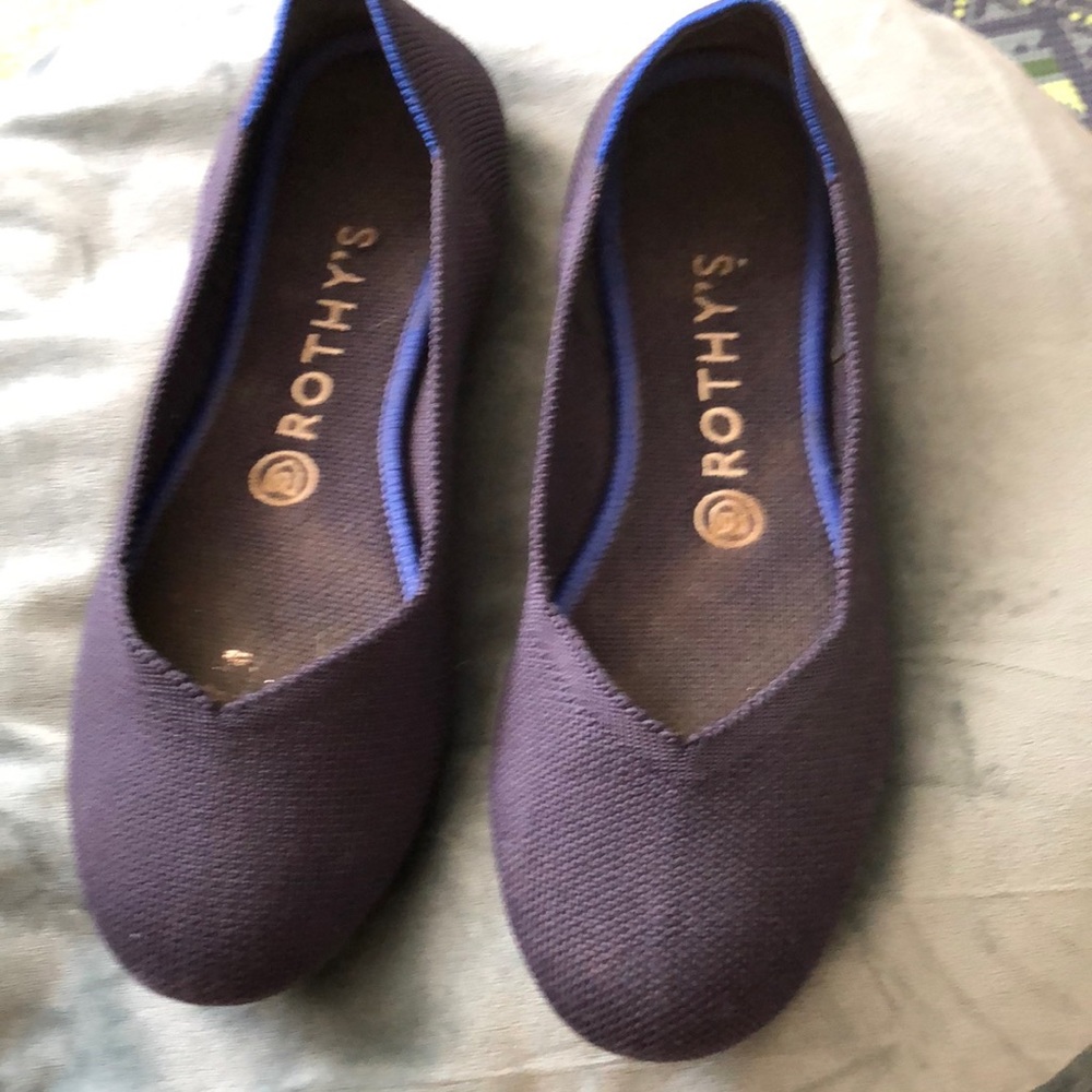 Rothy’s dark blue slip ons